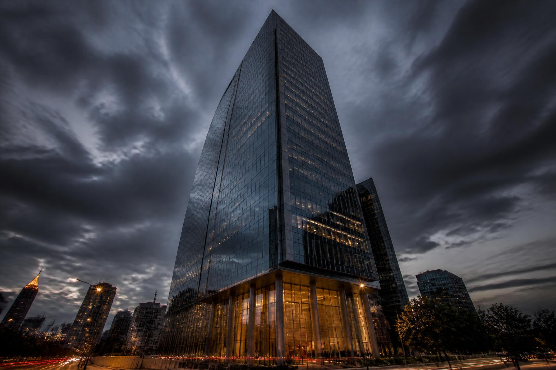 Class A commercial office tower at dusk